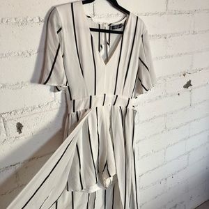 Glam romper with open maxi overlay